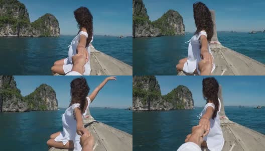 POV美丽的女人坐在泰国船鼻子抓住男人的手行动相机视图高清在线视频素材下载