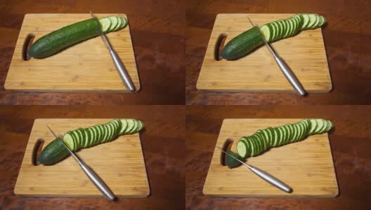 切黄瓜。在木砧板上切碎的蔬菜的特写。定格动画高清在线视频素材下载