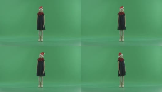 可爱的小女孩在圣诞帽，色度键背景高清在线视频素材下载