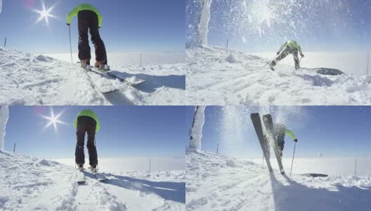 慢速宽:滑雪者从山顶开始起飞，喷雪高清在线视频素材下载