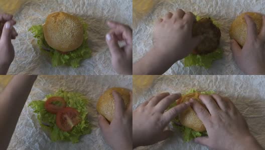 胖子从汉堡中拿出肉来，健康生活的决定，饮食的选择高清在线视频素材下载