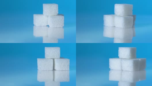 一组方糖在浅蓝色背景上的位置不同高清在线视频素材下载