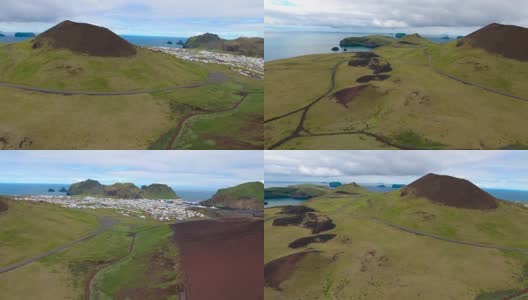 飞过冰岛海梅岛(威斯特曼群岛)的埃尔德费尔火山高清在线视频素材下载