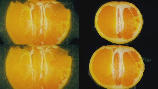 橙子和健康营养的果汁爆炸。健康食品的背景高清在线视频素材下载