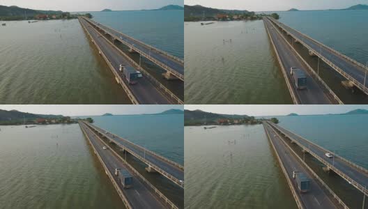 泰国宋克拉河上的卡车驾驶桥的鸟瞰图高清在线视频素材下载