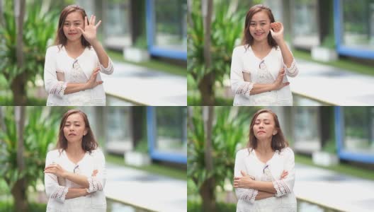 由亚洲奢华成熟女人打手势，招手手势，慢动作高清在线视频素材下载