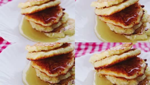 煎饼和蜂蜜。蜂蜜的顺畅流通。开胃的视频。高清在线视频素材下载