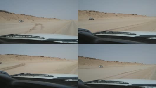 汽车在沙漠中行驶。从车内看高清在线视频素材下载