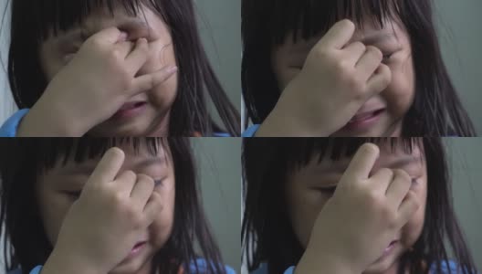 捂着脸的小女孩哭了高清在线视频素材下载