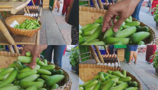 女人在街头小吃买黄瓜慢动作高清在线视频素材下载