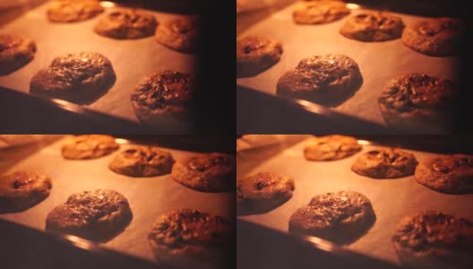 美国巧克力曲奇饼在烤箱烘烤过程中发酵高清在线视频素材下载