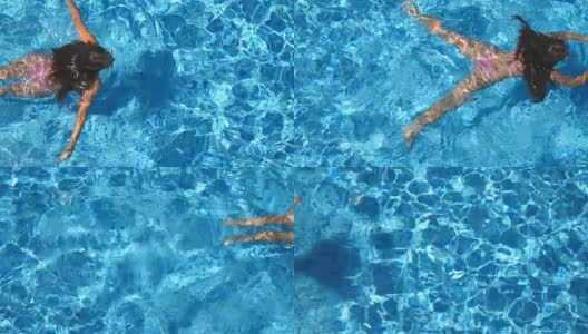 年轻美丽的女孩在粉红色比基尼漂浮在酒店的游泳池。在一个阳光明媚的日子里，一个不可辨认的棕色头发的女人在清澈的蓝色水池里游泳。暑假或假期的概念。俯视图特写高清在线视频素材下载