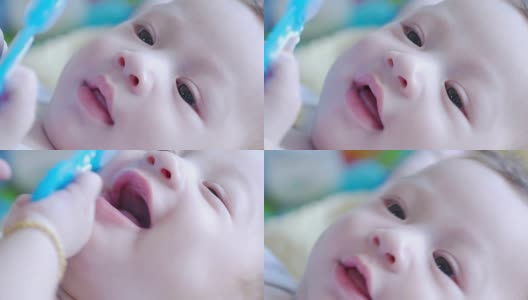 面部表情由亚洲小男孩，婴儿微笑高清在线视频素材下载