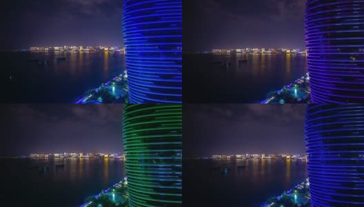 夜晚照亮三亚市湾屋顶全景4k时间推移海南岛中国高清在线视频素材下载