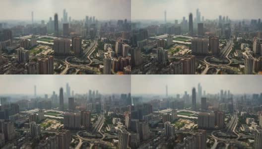 阳光明媚的一天广州市中心城市景观交通道路路口空中倾斜移位全景4k时间推移中国高清在线视频素材下载