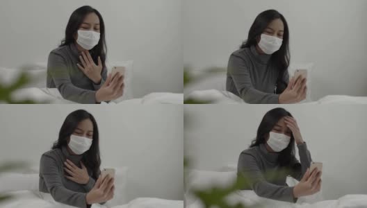 生病的年轻亚洲女子在线视频通话通过智能手机与医生交谈。高清在线视频素材下载