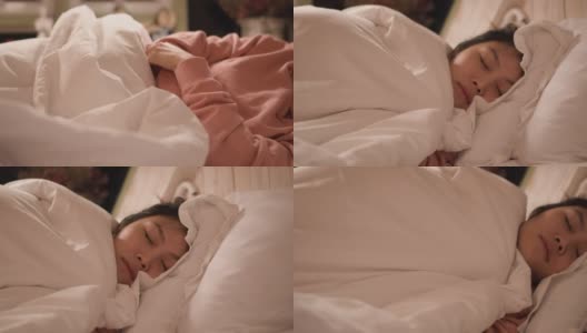 女人拉毯子睡觉高清在线视频素材下载