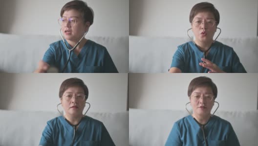 亚裔华人女医生用听诊器家访检查病人的个人观点高清在线视频素材下载
