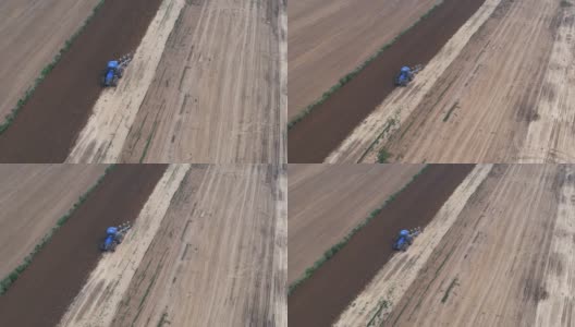 农用拖拉机耕地鸟瞰图高清在线视频素材下载
