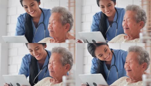 亚洲老年妇女与年轻的黑人女护士医生交谈，帮助患者在家里进行平板电脑治疗Covid-19病毒的教育。教育、医疗、护理、技术、老年护理、退休、志愿者、慈善、养老院、冠状病毒或新冠肺炎高清在线视频素材下载
