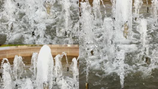 慢镜头镜头上喷泉的水滴和飞溅在空中。城市公园喷泉工作。高清在线视频素材下载
