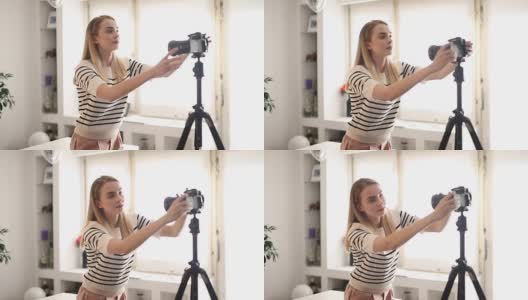 一名年轻女子在开始拍短视频之前修好了她的相机高清在线视频素材下载