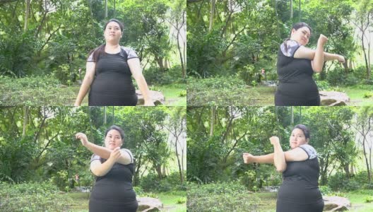 超重的亚洲妇女在公园练习运动高清在线视频素材下载