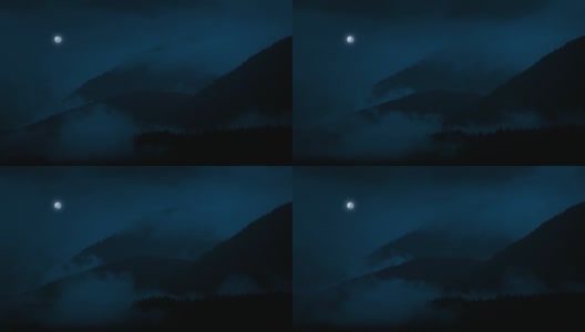 朦胧的山与月亮的夜晚高清在线视频素材下载