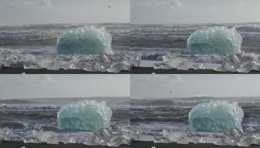 巨大的海浪拍打着冰岛的冰山高清在线视频素材下载