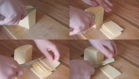妇女们用金属刀切奶酪高清在线视频素材下载