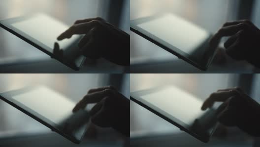 特写女性的手触摸数字平板电脑与业务图表高清在线视频素材下载