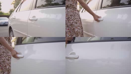 亚洲女人上白色的车。高清在线视频素材下载