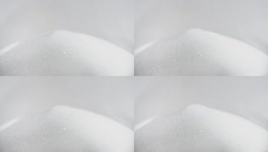 糖或盐或白色颗粒状的小晶体高清在线视频素材下载