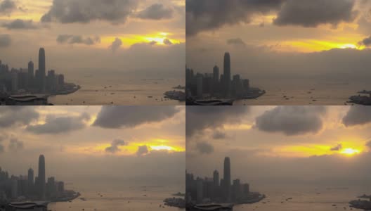 4K时间推移宽拍摄高角度鸟瞰图移动云在摩天大楼城市景观商业金融大厦大厦和水运输物流日落形成Braemar山，中国香港。高清在线视频素材下载