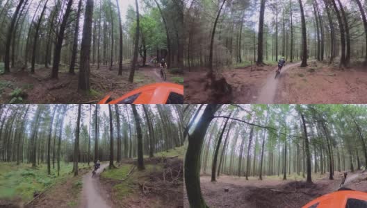 山地自行车手骑着自行车穿过森林高清在线视频素材下载