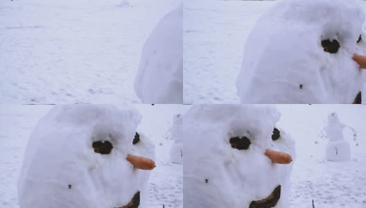 雪人。有孩子的雪人高清在线视频素材下载