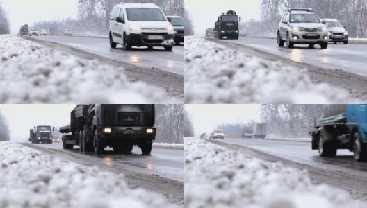 冬季公路上的运输。汽车在交通堵塞中受阻。高清在线视频素材下载