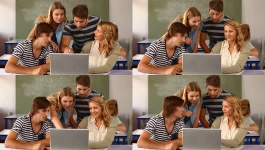 一组学生在教室使用笔记本电脑高清在线视频素材下载