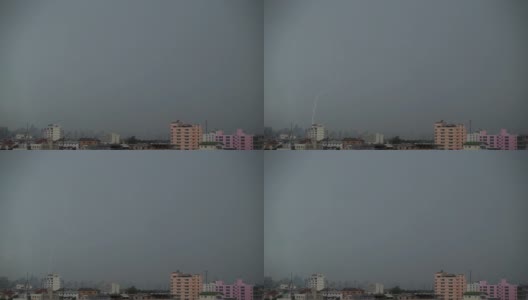 闪电和雷暴云笼罩曼谷的城市景观。高清在线视频素材下载