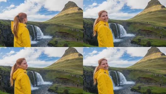 游客探索冰岛，欣赏其最具标志性的地标之一高清在线视频素材下载