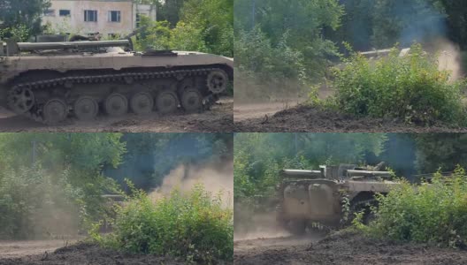 军事坦克移动在背景破坏建筑在敌对行动高清在线视频素材下载