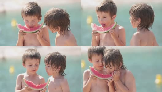 两个小孩，男孩兄弟，夏天的时候在海滩上吃西瓜高清在线视频素材下载