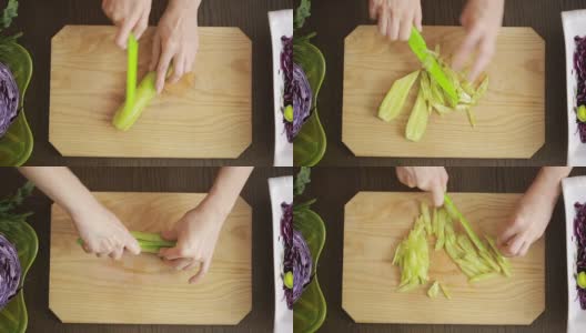 女人的手用刀切红卷心菜沙拉。切黄瓜高清在线视频素材下载