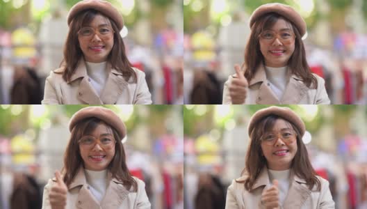 亚洲成熟女性的面部表情，好的和成功的标志，竖起大拇指高清在线视频素材下载
