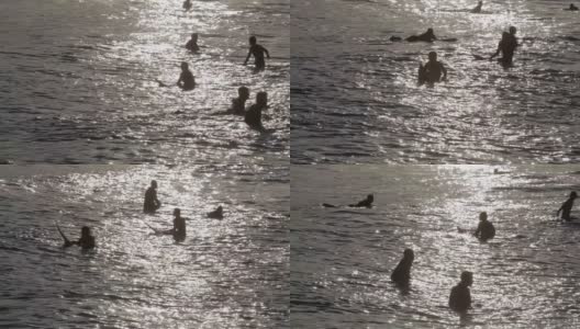海上冲浪者的剪影高清在线视频素材下载