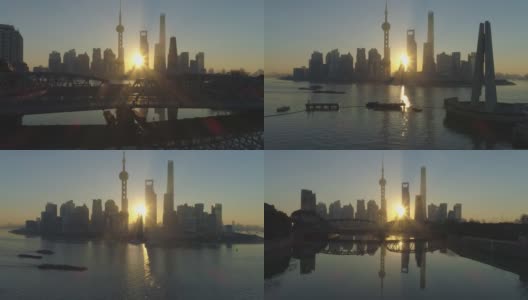 上海天际线在阳光明媚的早晨日出。中国鸟瞰图。无人机正在外白渡桥上空飞行。远景高清在线视频素材下载