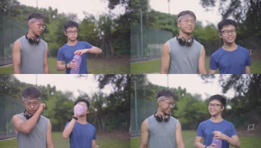 2个亚洲中国少年男孩在日常锻炼后互相交流。高清在线视频素材下载