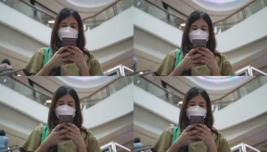 商场自动扶梯上戴口罩的女人高清在线视频素材下载