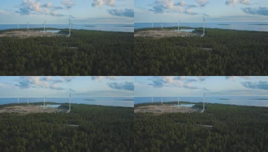 航拍的森林和有风力发电厂的海岸线高清在线视频素材下载