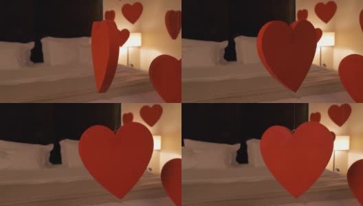 卧室内饰浪漫，床上方装饰有心形高清在线视频素材下载